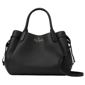 A black Kate Spade New York handbag with dual handles and a detachable shoulder strap, featuring a pebbled leather texture.