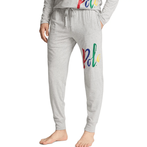 Light gray joggers with a colorful \“Polo\“ logo on the left leg, featuring a drawstring waistband and side pockets.