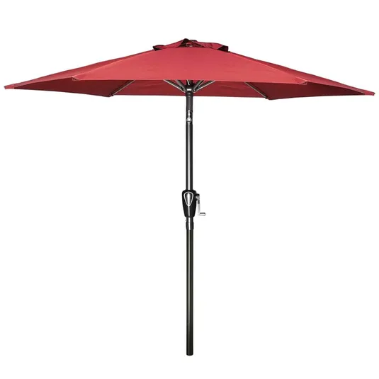 A red patio umbrella with a crank handle for easy opening and closing.