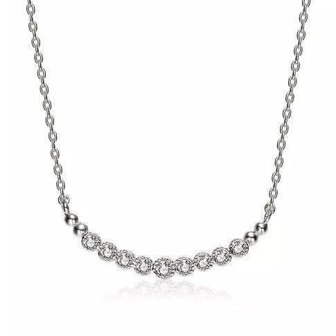 Sterling Silver Necklace features a row of bezel-set cubic zirconia stones on a delicate chain, offering a simple yet elegant look.