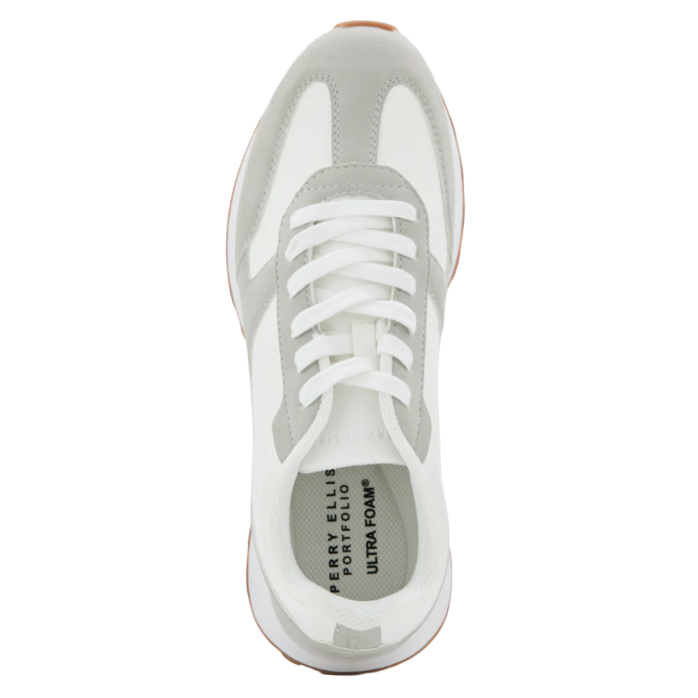 A white and light gray sneaker with white laces, featuring text on the insole that reads \“Perry Ellis Portfolio Ultra Foam.\“