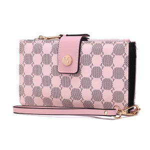 A pink crossbody wallet with a black geometric pattern, gold-tone hardware, and a strap. The closure features a flap with a gold \“M\“ emblem.