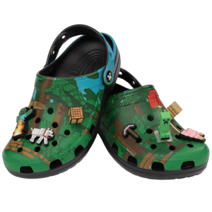 Green Crocs featuring a Minecraft theme with various game-related charms, such as blocks, tools, and characters, attached to the surface.