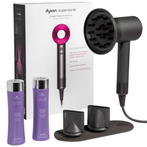 Dyson Supersonic hair dryer with attachments, accompanied by Alterna Caviar shampoo and conditioner.