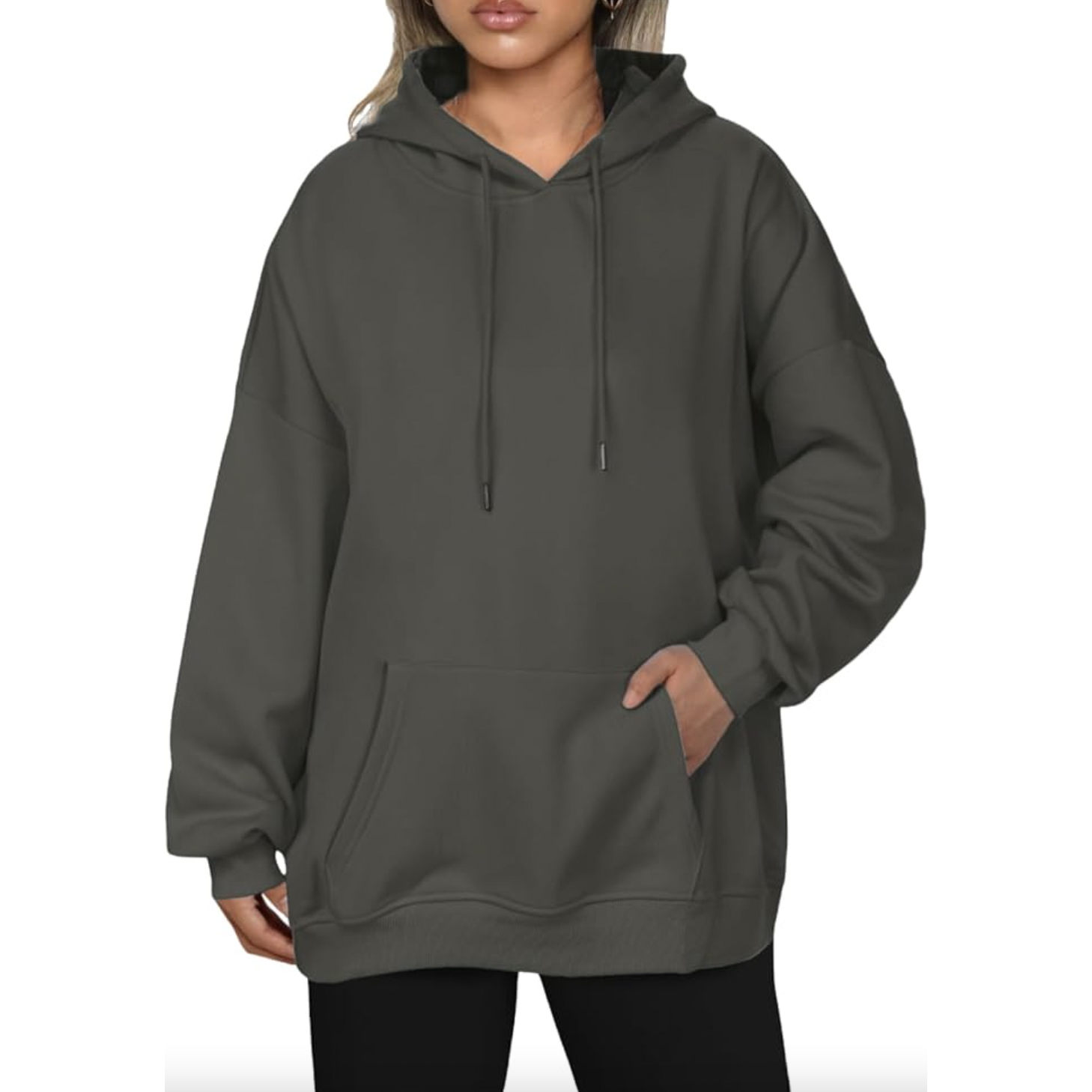 A dark gray oversized hoodie featuring a front pocket, drawstrings, and a relaxed fit.
