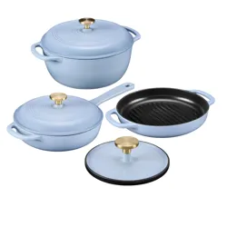 A set of light blue enameled cast iron cookware featuring a Dutch oven with lid, a skillet with lid, and a grill pan. The pieces have brass-colored handles.
