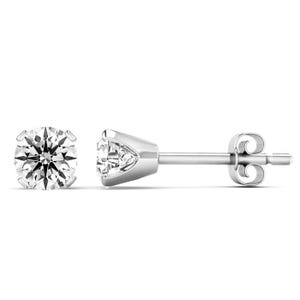 Round brilliant diamond studs set in a four-prong white gold setting, featuring nearly 3/4 carat stones with a butterfly backing.