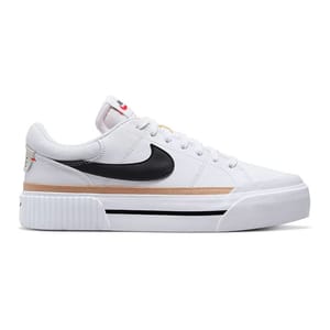 Nike Legacy Lift Shoes feature a white upper with a black Swoosh, a ribbed platform midsole, and tan accents. They have a lace-up closure, providing a modern and stylish look.