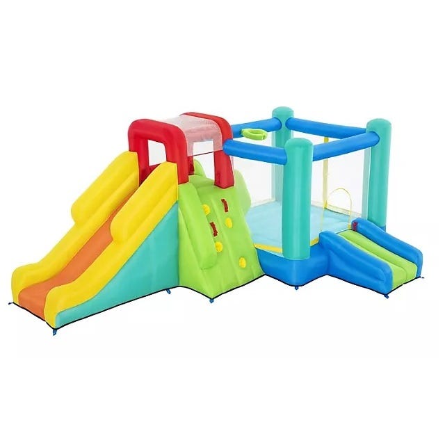 Inflatable play center with bright colors featuring a slide, climbing wall, and bounce area, designed for children's outdoor play.