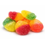 A pile of sugar-coated, multicolored gummy candies in red, yellow, orange, and green.