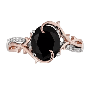 This is a rose gold ring with a large black gemstone in the center, surrounded by clear gem accents and thorn-like embellishments suggesting a Disney Villain theme.