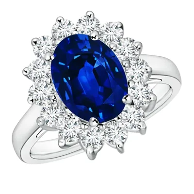 A white gold ring featuring a large oval blue sapphire surrounded by a halo of round white diamonds.