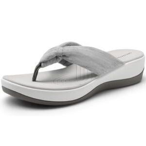 Women's cushioned thong sandals with a soft fabric strap, light gray upper, and supportive wedge sole.