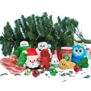A colorful Christmas scene with plush toys including a snowman, Santa, gingerbread man, Christmas tree, and a monster, surrounded by festive ornaments and a fallen Christmas tree.