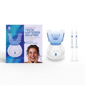 Advanced LED teeth whitening kit includes a mouthpiece with LED technology, two syringes of whitening gel, and packaging for 20 treatments to remove stains.