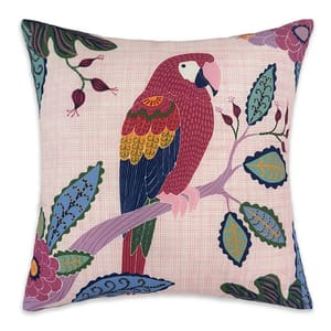 Decorative pillow featuring a colorful parrot perched on a branch with surrounding vibrant floral motifs.