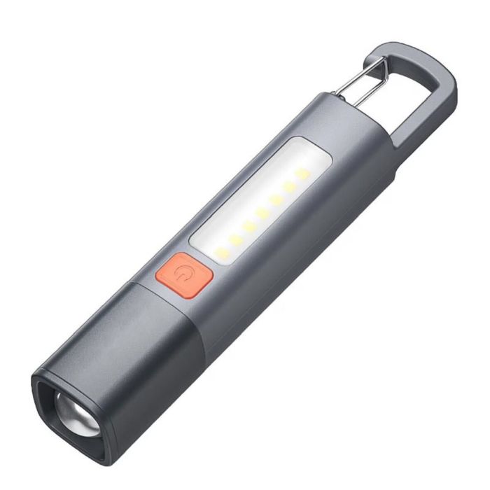 A compact, gray LED flashlight with a row of additional lights on the side, featuring an orange power button and a metal clip at one end for easy attachment.