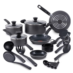 18-piece T-Fal nonstick cookware set includes various pots and pans with lids, a frying pan, a saucepan, a small egg pan, slotted and solid spoons, spatulas, ladles, pasta server, measuring cups, and spoons, all in black with nonstick surfaces and ergonomic handles.