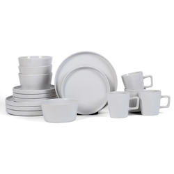 A complete set of white dinnerware including plates, bowls, and mugs with a sleek, minimalist design.