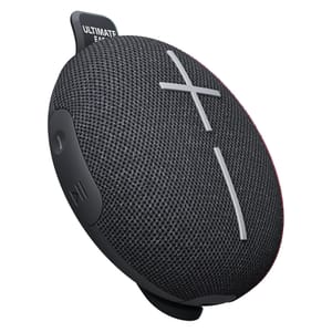 Ultimate Ears Miniroll Speaker is a compact, round Bluetooth speaker with a mesh fabric surface, featuring large '+' and '−' volume buttons on the front and a rubberized edge with control buttons.