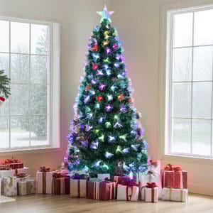 A Christmas tree adorned with colorful fiber optic lights and a star topper, surrounded by wrapped presents in a bright living room.