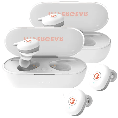 Two pairs of white wireless earbuds with wing tips, branded with an orange logo, shown next to and inside matching charging cases.