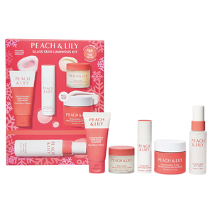 Peach & Lily Glass Skin Luminous Kit includes a HydroBubble Deep Foam Cleanser, Glass Skin Refining Serum, Rice Dough Smoothing Facial Scrub, Transparent-C Pro Brightening Moisturizer, and Glass Skin Veil Mist.