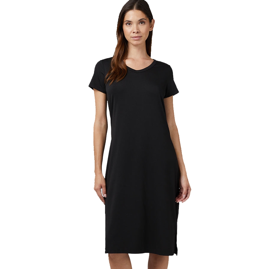 A woman is wearing a simple black, short-sleeved, knee-length dress with a round neckline.