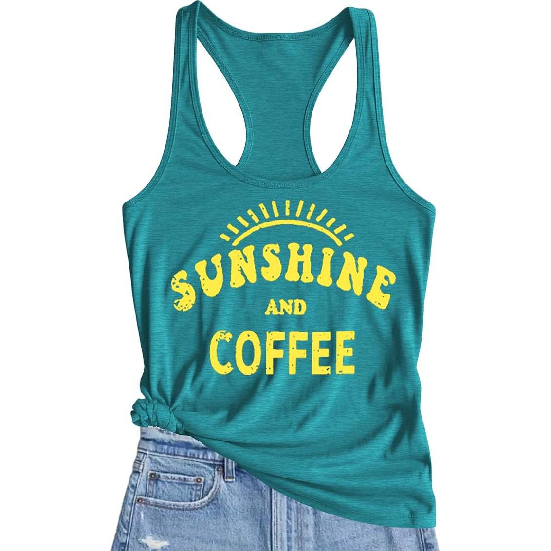 A teal racerback tank top with \“Sunshine and Coffee\“ printed in bold yellow lettering, paired with light blue denim shorts.