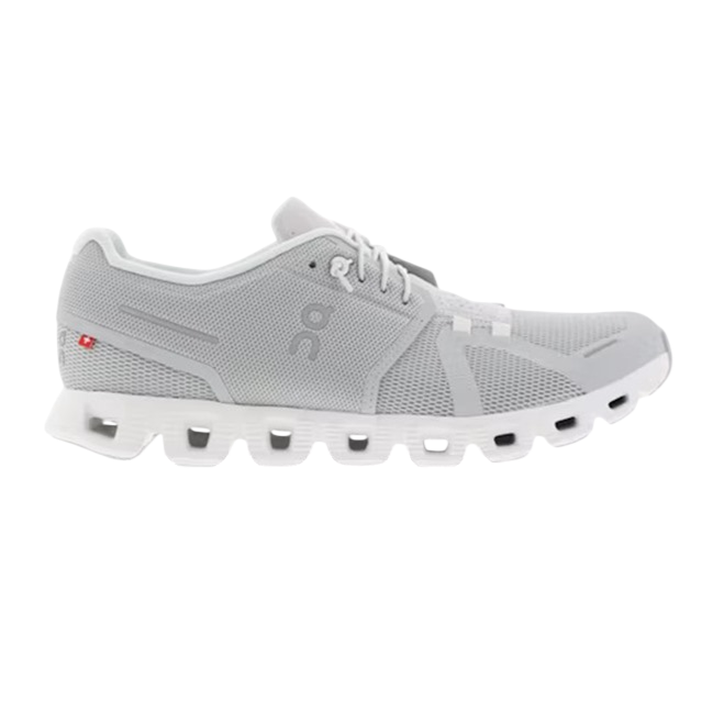 A gray athletic shoe featuring a mesh upper and a unique cushioned sole design, with a small logo on the side.