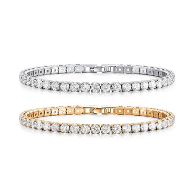Two tennis bracelets featuring round diamonds, one set in white metal and the other in yellow metal.