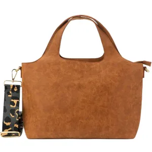 Brown handbag with integrated handles, featuring a detachable strap with a leopard print pattern.