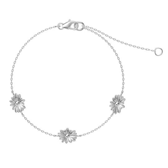 Silver bracelet with three daisy flower charms evenly spaced along a delicate chain, featuring a lobster clasp and an extender chain.