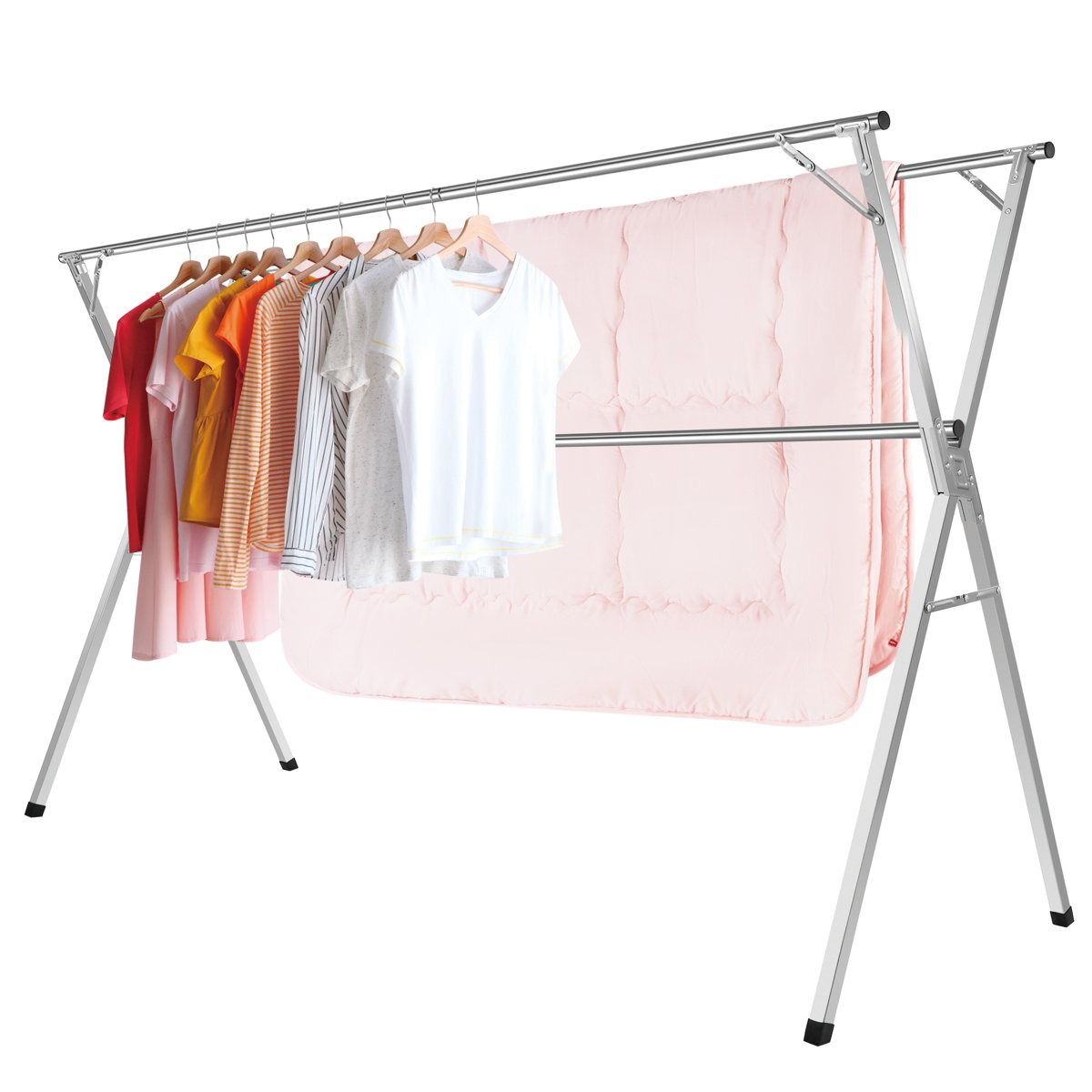 A metal clothes drying rack holds a row of colorful shirts on hangers, with a pink blanket draped over a lower bar. The rack is designed for efficient indoor or outdoor garment drying.