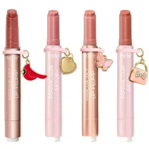 Four Tarte Maracuja Juicy Lip Plump products in various shades, each featuring a unique charm: a cardinal, a heart, a butterfly, and a handbag.