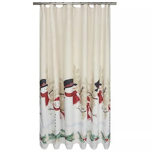 Shower curtain featuring snowmen with black hats and red scarves, set against a wintery background with trees and greenery.