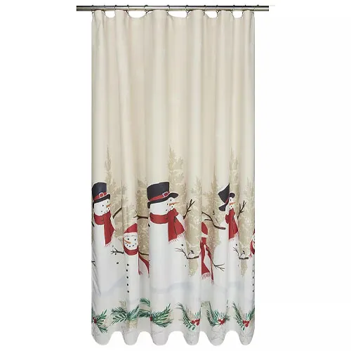 Shower curtain featuring snowmen with black hats and red scarves, set against a wintery background with trees and greenery.