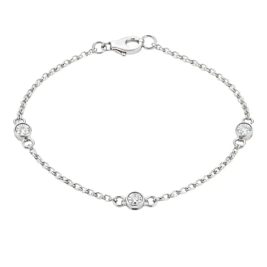 A delicate silver bracelet with a chain design featuring three evenly spaced round clear gemstones and a lobster clasp closure.