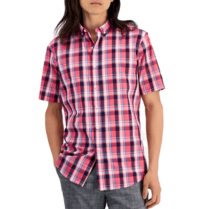 A short-sleeve, button-up, all-cotton shirt featuring a vibrant pink, navy, and white plaid pattern. The shirt has a classic collar and a relaxed fit, paired with gray pants.