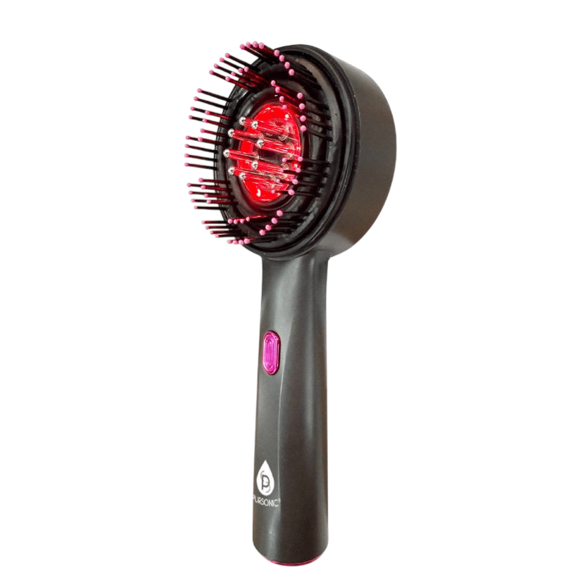 A handheld device with a rounded brush and protruding bristles featuring red lights inside, possibly for hair care or scalp treatment.