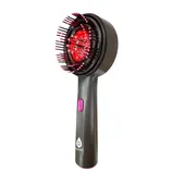 A handheld device with a rounded brush and protruding bristles featuring red lights inside, possibly for hair care or scalp treatment.