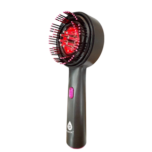 A handheld device with a rounded brush and protruding bristles featuring red lights inside, possibly for hair care or scalp treatment.
