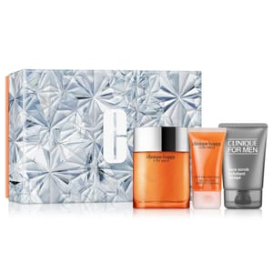 Clinique for Men set featuring Happy fragrance, 2-in-1 body and hair wash, and an exfoliating face scrub, with a geometric-patterned box.