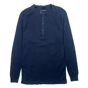 A navy blue long-sleeve henley shirt featuring a waffle texture and a buttoned placket.