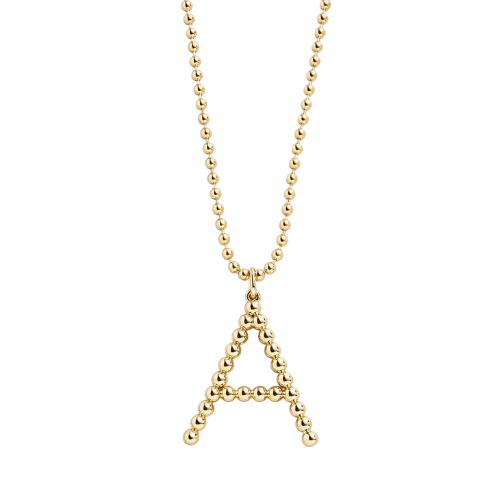 A gold beaded necklace with a pendant shaped like the letter \“A,\“ featuring a series of small, spherical beads.