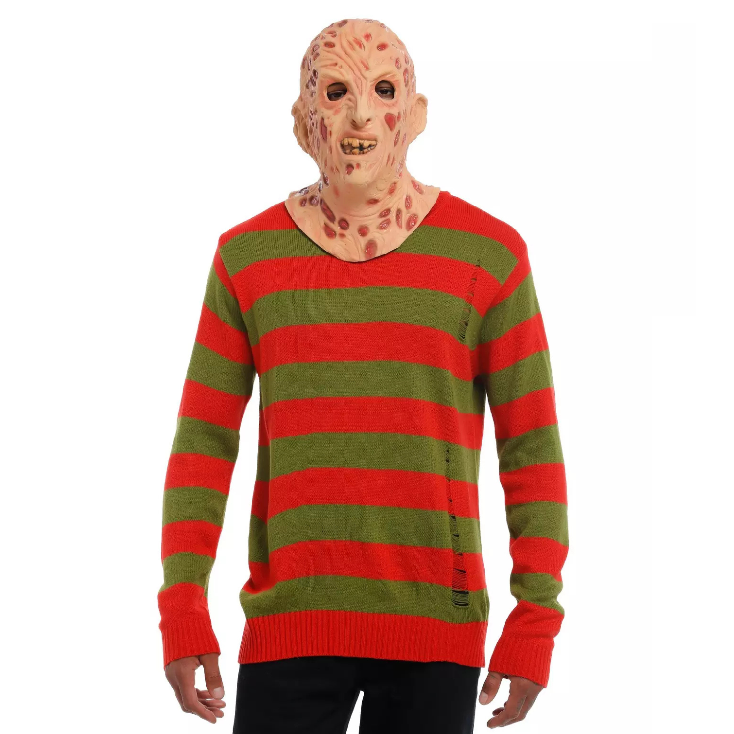 A person is wearing a red and green striped sweater with a Halloween horror mask.