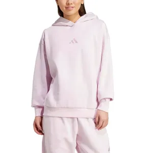 A person is wearing a light pink Adidas hoodie and matching sweatpants. The hoodie features the Adidas logo on the front.