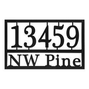 Black metal address plaque with the number \“13459\“ above the street name \“NW Pine,\“ featuring a rectangular cutout design.