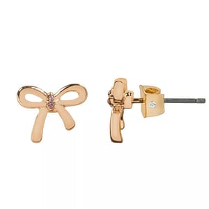 Gold bow-shaped stud earrings with a small pink gemstone center and butterfly backings.