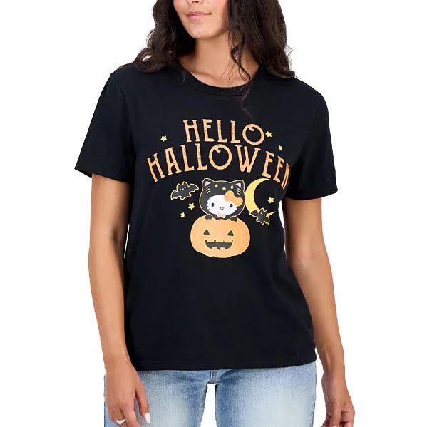 Black T-shirt featuring \“Hello Halloween\“ text with a cute cat inside a pumpkin, surrounded by stars, bats, and a crescent moon.